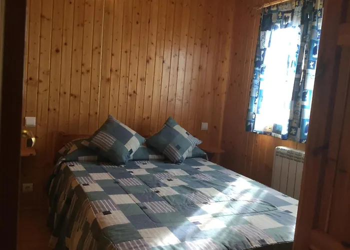 Casitas Cinco Castanos Parque de Campismo